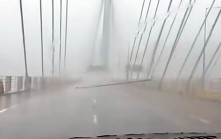 韋帕颱風．有片｜汀九橋塌燈柱阻三線  車輛慢駛繞過　