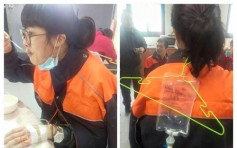 台北女警为执勤自制「人肉点滴架」　获网民致敬