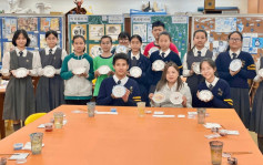 國安教育日︱啟德主場館現宣傳字句 羅淑佩訪中學體驗非遺「廣彩」