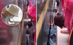 幼童跌落火车路轨 大学生爬下月台缝隙救人