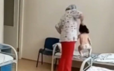 成个扯起挞落病牀 俄罗斯女病童惨被护士扯头发 