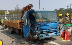 大埔公路吊臂车撼运油车 司机受伤一度被困