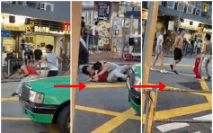 【有片】兩男元朗馬路肉搏扯爛衫 車來車往埸面驚險