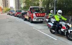 警巡九龙城交通黑点拖走13车 检控不守法过路行人