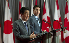安倍访问加拿大讨论贸易、中国等议题