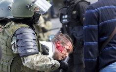 白俄示威持续拘捕逾400人 卢卡申科将晤普京寻求支持
