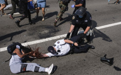 美4警撐警遊行中遇襲受傷 逾30人被捕