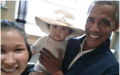 机场巧遇奥巴马　半岁女婴获抱起合照