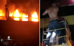 湖南娱乐场所大楼起火酿16伤 民众用吊车救人