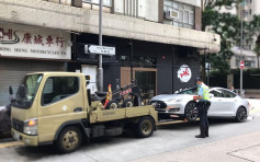 港岛警打击交通违例 发3734张牛肉乾拖走9车