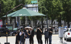 南韩增56宗病例43宗属社区感染 3医护高温为市民检测中暑晕倒