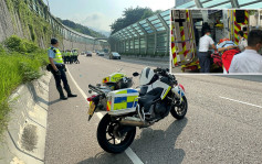 屯门公路护土墙渗水流落路面 交通警跣胎滑行70米受伤送院