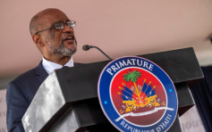 海地新总理亨利宣誓就职 承诺改善治安并举办大选