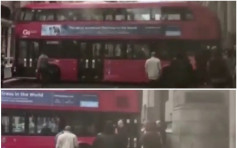 【有片】调头不当　大红巴士伦敦闹市拦路