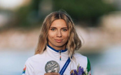 白俄女跑手拍卖100米银牌 支援国内受迫害运动员