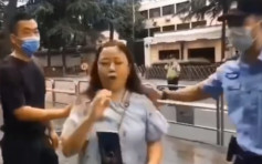 女网红美国驻成都总领馆外高唱「我爱你中国」 被警驱赶