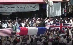 庆祝美军撤离 塔利班支持者为北约办「葬礼」