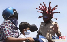 印度警戴「新冠病毒头盔」 出奇招呼吁民众留在家