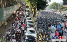 廣州海珠區停課禁堂食地鐵巴士停運 數以百計民眾踩單車出門