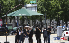 南韩增56宗病例43宗属社区感染 3医护高温为市民检测中暑晕倒