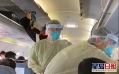 【武漢肺炎】澳門防疫人員航班上為乘客量體溫獲內地網民讚好