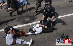 美4警撐警遊行中遇襲受傷 逾30人被捕