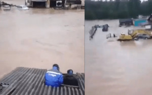 俄罗斯中部暴雨致水坝决堤 数村庄紧急疏散数十人 居民屋顶待救
