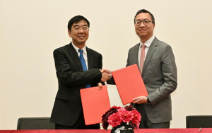 林定國與重慶市司法局簽署法律服務合作框架安排  深化兩地法律服務交流合作