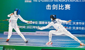 江旻憓（右）擊敗奧運冠軍孫一文，奪得銅牌。