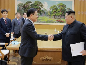 金正恩接见南韩代表。 网图