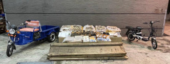 行动中检获的鱼翅、雪茄及名牌手袋等货物。图:警方提供
