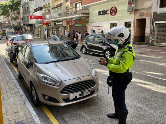 警方在区内多个交通黑点采取执法行动。警方图片