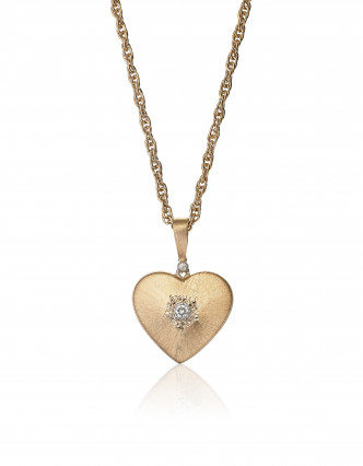 Macri玫瑰金钻石心形吊坠项链/$32,500/Buccellati。