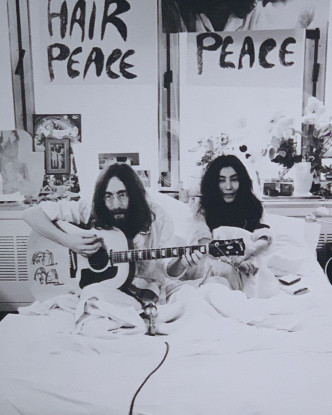 第二次的Bed-in预计在纽约进行，但当时约翰遭美国禁止入境，只好飞往加拿大，入住伊丽莎白皇后饭店。当记者问约翰今次的Bed-in行动希望达成什么？他说：「Just give peace a chance」，于是约翰在房间完成《Give Peace a Chance》这首反战名曲的创作与录音。