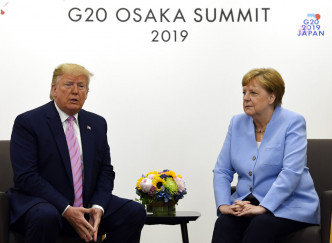 特朗普与德国女总理默克尔进行双边会谈。 AP图片