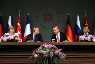 德国总理默克尔、俄罗斯总统普京、土耳其总统埃尔多安、法国总统马克龙。AP