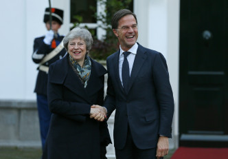 英國首相文翠珊與荷蘭首相呂特進行會談。AP