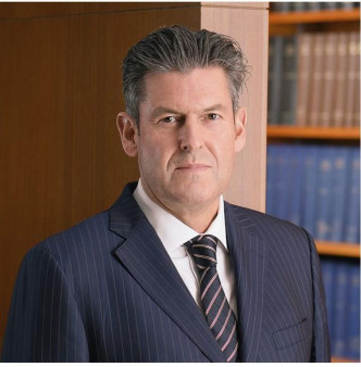 律政司前副國際法律專員Wayne Walsh 。網圖