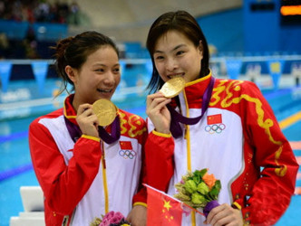 吴敏霞在四届奥运比赛共摘得5金2银。网图