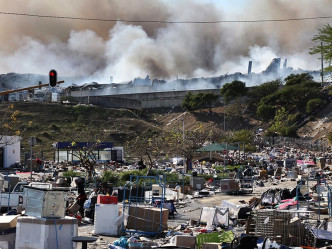 南非大規模騷亂持續。AP圖片