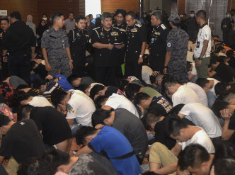 680名中國籍人員被捕。AP