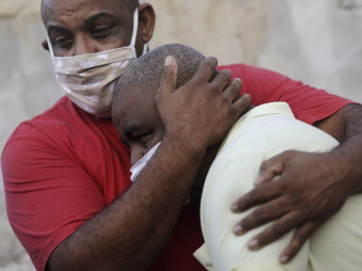 巴西過去一日再多1179人死於新冠肺炎。AP