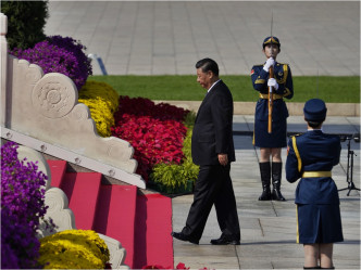 國家主席習近平到天安門廣場出席烈士紀念日儀式。AP圖片