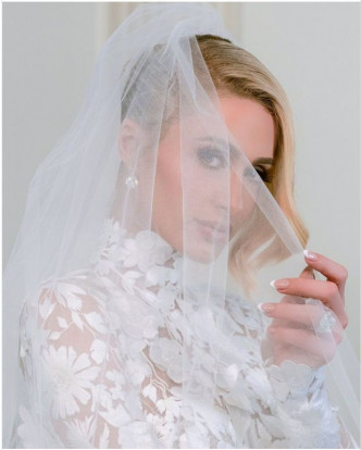 Paris Hilton与老公Carter Reum今年初订婚，昨日正式结婚。