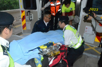 男跑手昏迷，送往律敦治醫院。