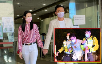 杨明拖实女友离开法院，对记者提问未有回答。