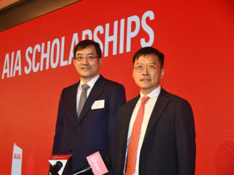 友邦保险区域首席执行官陈荣声（左）、友邦保险集团首席执行官兼总裁李源祥（右）。