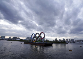 疫情持续使东京奥运能否顺利进行，再添变数。AP图