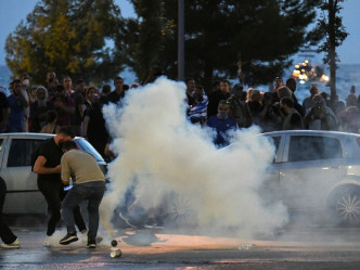 示威演變成警民衝突。REUTERS