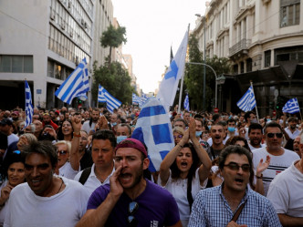 希腊首都雅典约5千人上街抗议。REUTERS